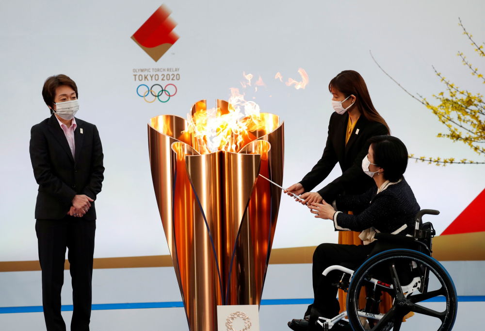 مراسم بی سر و صدای حمل مشعل المپیک در جاپان